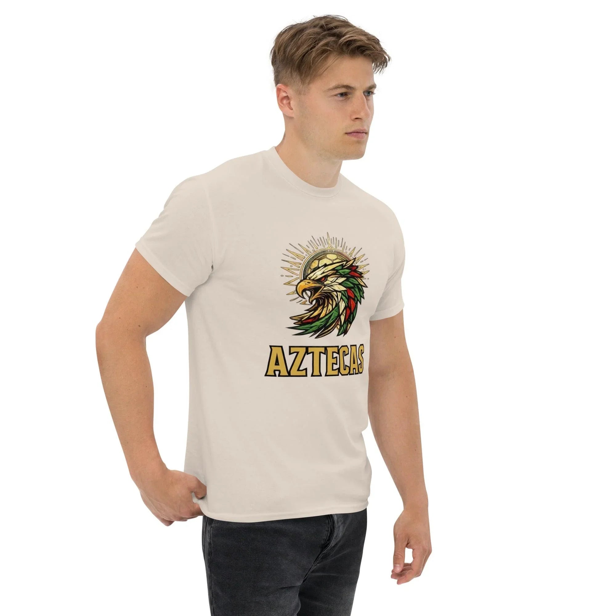 Man wearing cream Aztecas t-shirt with eagle and soccer ball graphic, sports fan apparel